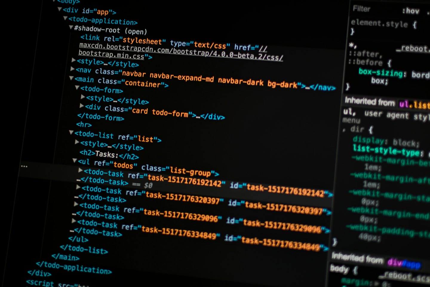 Computer screen displaying web development code and styling.